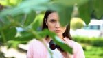 woman-with-binoculars-hiding-behind-a-bush-observing-her-target-1024x576.jpg